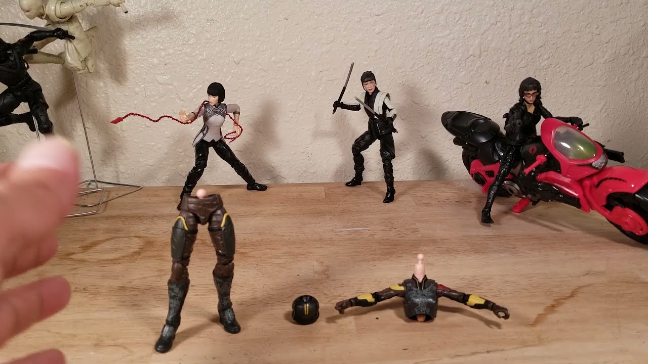 popping the Snake eyes movie Scarlett figure 1/2