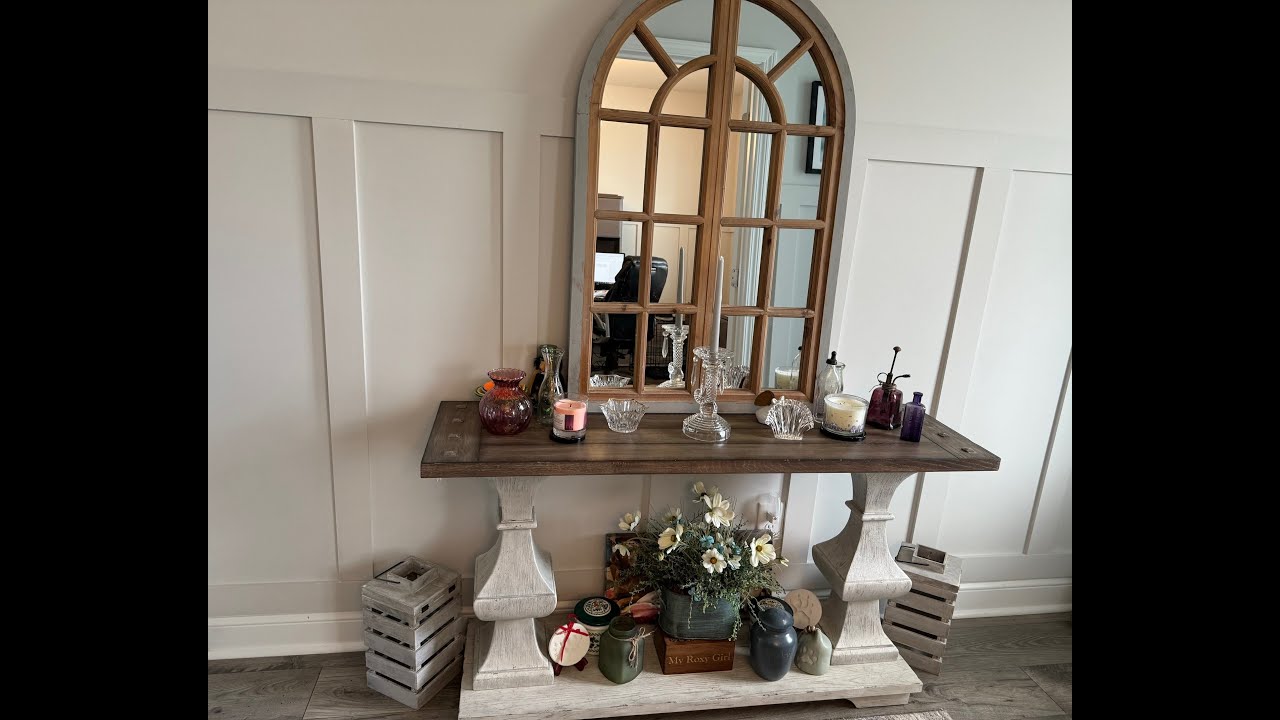 Thrifted mirror and plant stand/stool.  DIY Board and Batten Entryway and Office.