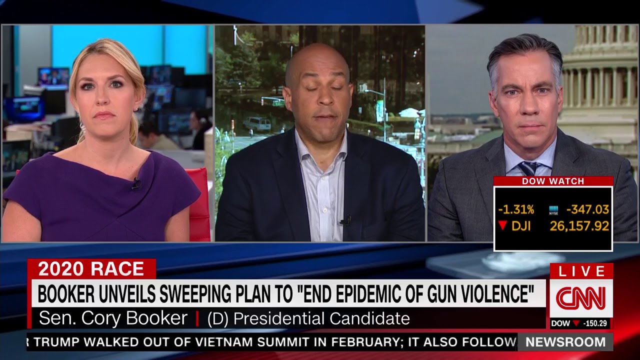 newspaper mockup Booker Won't Say If He'd Jail Firearm Owners Who Won't Sell Them Back