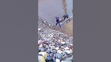 Efficient sand and gravel unloading process - Good tools and machinery make work easy