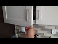 Under cabinet light treatment for frameless wall cabinets Under cabinet light treatment for frameless wall cabinets