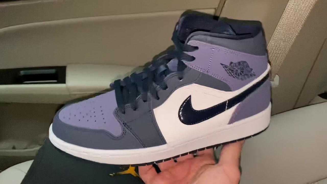 jordan 1 mid obsidian sanded purple on feet