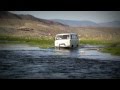 Crossing small river in Mongolian Altai