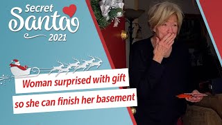 Woman surprised with gift from a Secret Santa so she can finish her basement