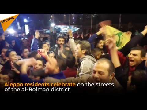 Residents Celebrate The Syrian Army's  Victory In Aleppo