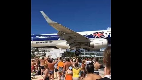 Embraer ERJ-190 landing at Saint Martin, northeast Caribbean.