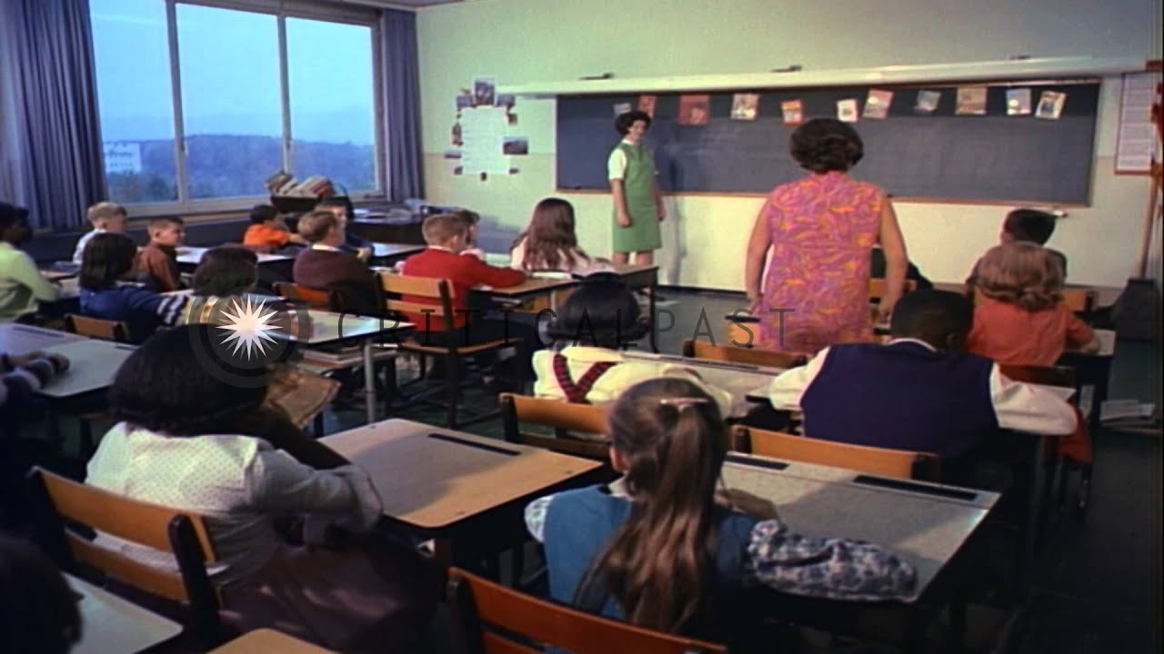 A teacher asks questions in an English class at the American Elementary