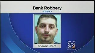 Bank Robbery Suspect Tries To Make Getaway On SUV