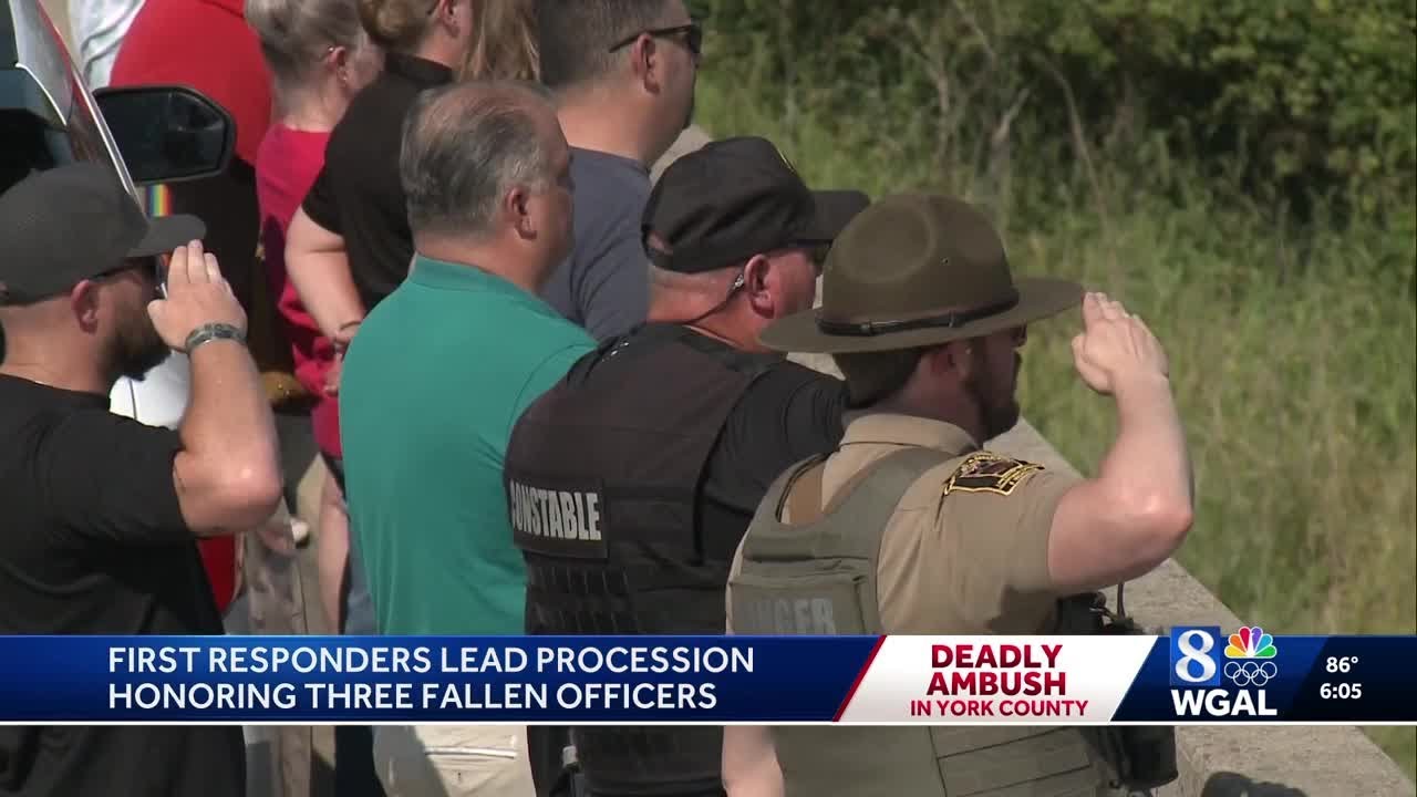 Growing memorial for fallen officers as community pays respects - YouTube