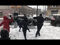 Watch NYPD Officers Get Into Snowball Fight With Kids During Snowstorm