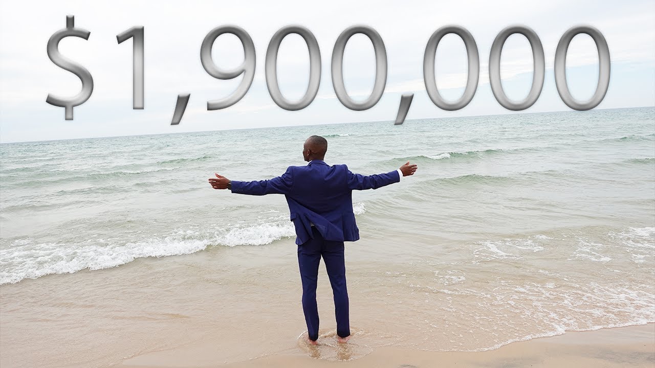 A Slice of Michigan's Pride: 124 Feet of Private Lake Michigan Shoreline on This Home's Property