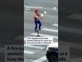 A fire-juggling cyclist was spotted putting on a show at a busy intersection in Colorado