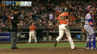 NYM@SF: Nunez brings home Posey on fielder's choice