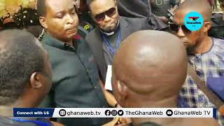 Chairman Wontumi cries as he files past John Kumah's body