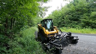 Power Raking a Gravel Road with Caterpillar 259D3 PR121 and CV119