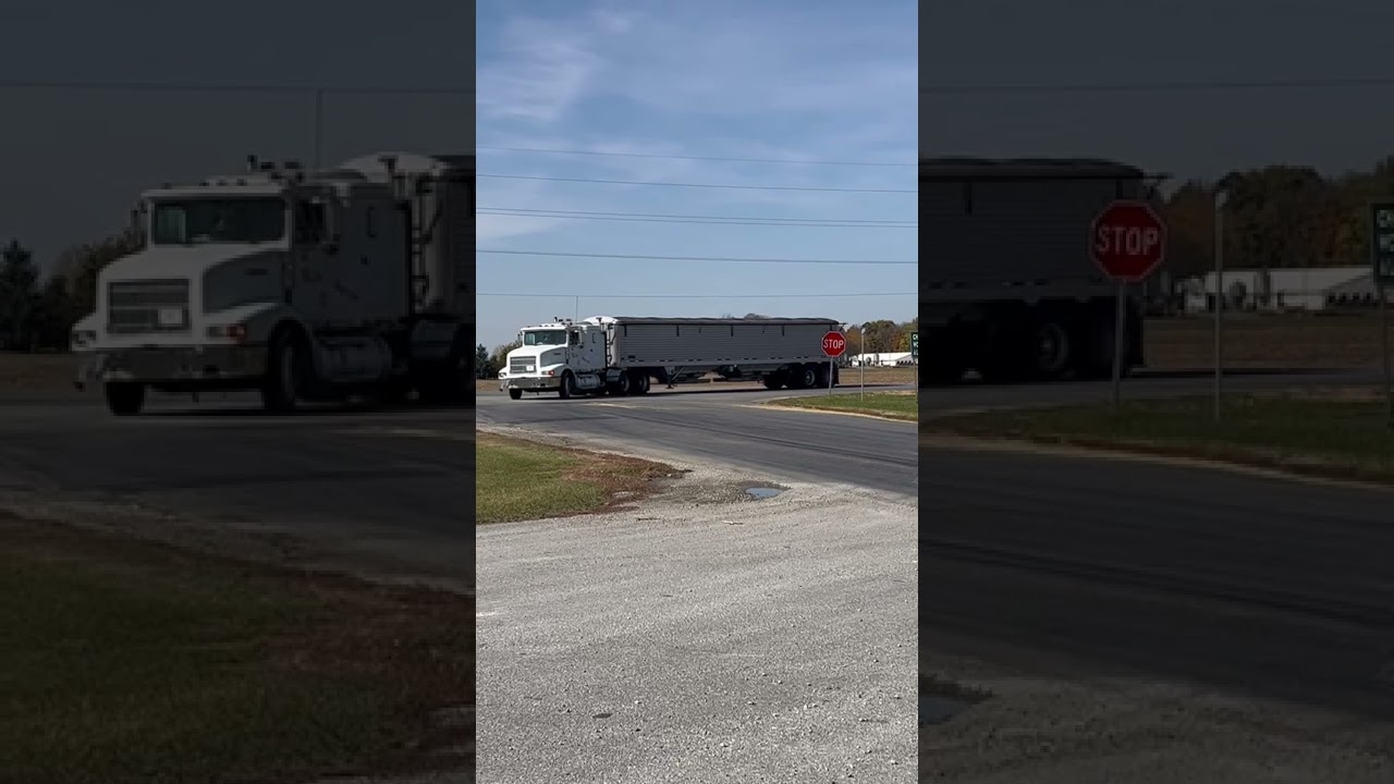 International 9200 Hauling a Grain Trailer. 