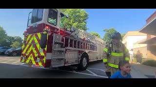A.\nFire truck pulled up and federal q siren did a quick growl