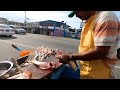 Buying fish from the cart in guyana