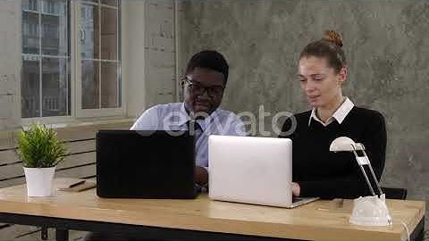 Two software developers working on a new project | Stock Footage - Videohive
