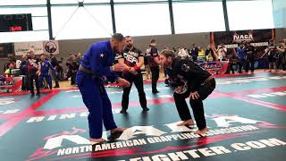 CROSS COLLAR FROM KNEE SLICE DYLAN MILLER (NOVA MENTE JIU JITSU) vs DANIEL BRAUCHLE (LPJJG)
