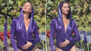 Gisele Bündchen poses provocatively during a sizzling picture shoot in a thong swimsuit.