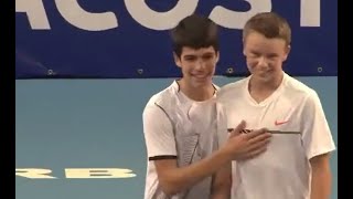 Young Carlos Alcaraz and Holger Rune playing together doubles
