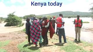Helicopter rescue people trapped in a flooded river