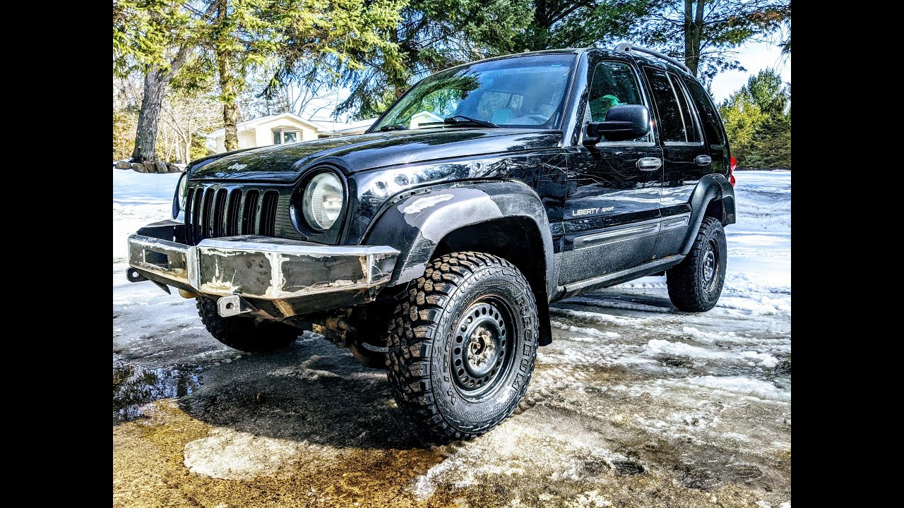 CUSTOM JEEP LIBERTY BUMPERS AND LIFT - YouTube