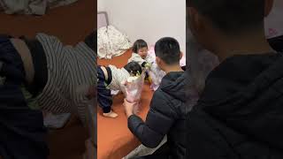 Dad borrows flowers to give ceremony to every girl in family.