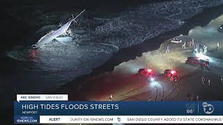 High tide brought flooding to several newport beach streets and the
orange county coastline on saturday.