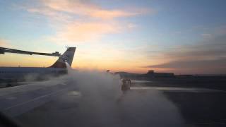 Anti-Freeze Sprayed On Airplane Wings