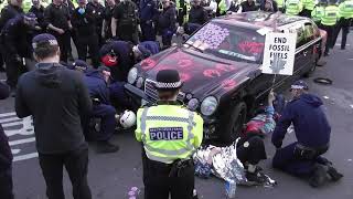 police remove protesters chained  under a car #metpolice