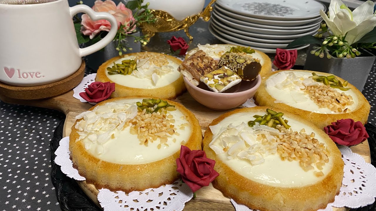 بسبوسة بجوز الهند والكريمة على شكل ترتولات بنة رائعة أكدولي على التعسال basbousa a la crème delice