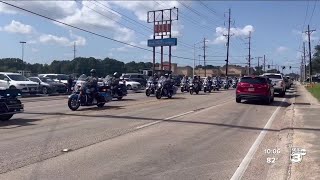 Cars line the streets for funeral procession of Sr. Cpl. Segus Jolivette