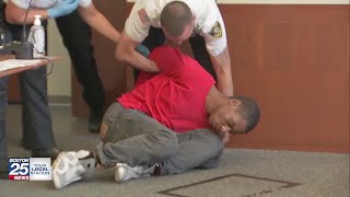 Suspect in road-rage stabbing of delivery driver in Boston faints in court when judge sets bail