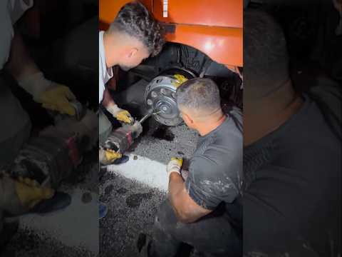 Midnight repair and change tires on street thumbnail