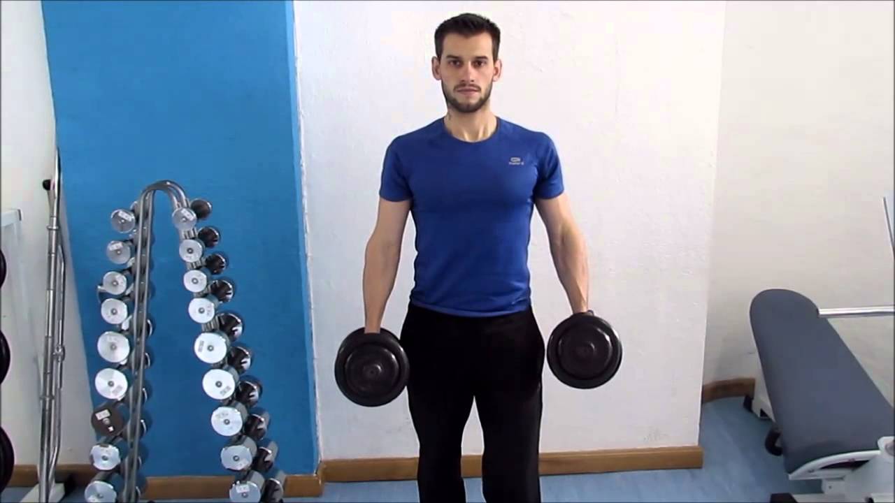 Curl mancuernas simultaneas giro de pie YouTube