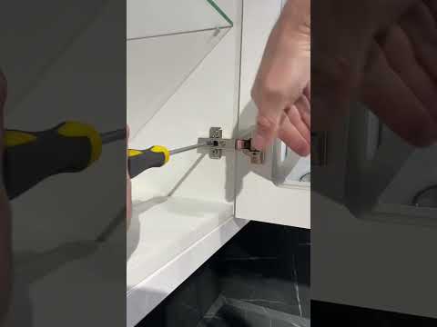 Как регулировать петли Blum на двери кухонного гарнитура.