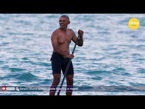 Barack Obama spotted paddle boarding in Hawaii