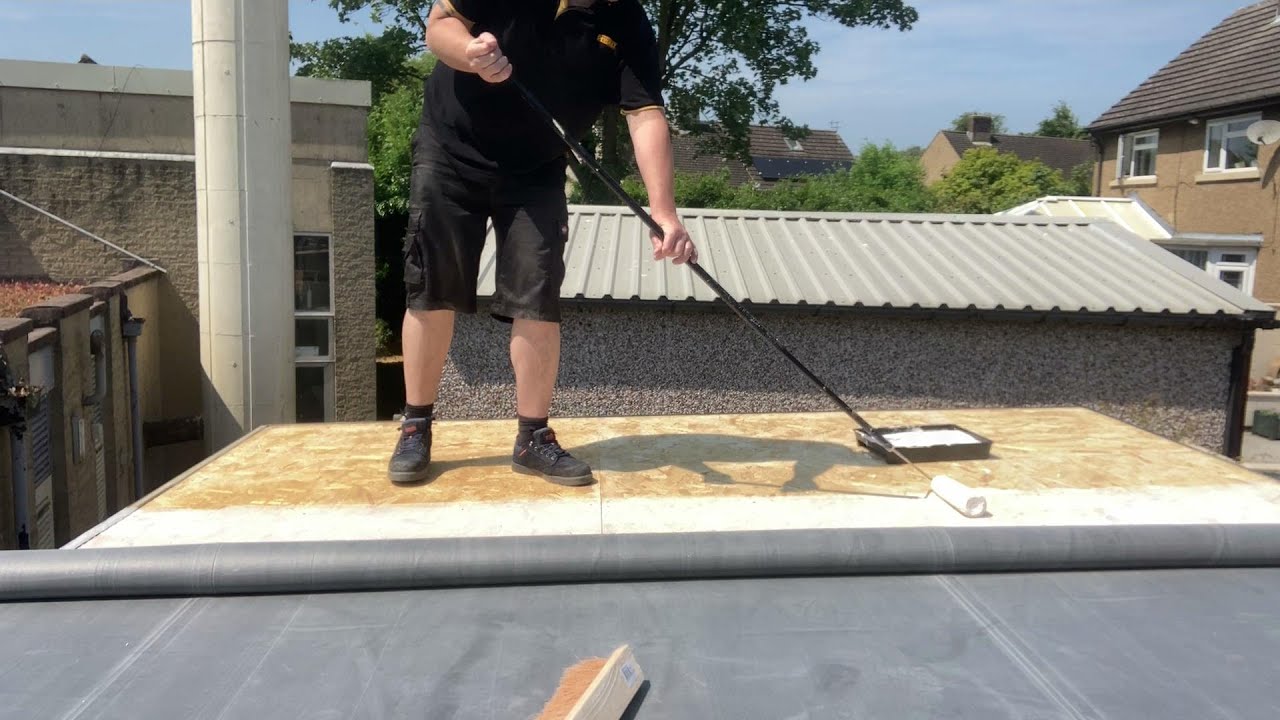 Professional flat roof installation with EPDM rubber roofing