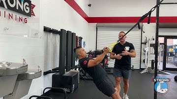 How to do TRX Bicep Curls to Build Size and Strength in Your Arms