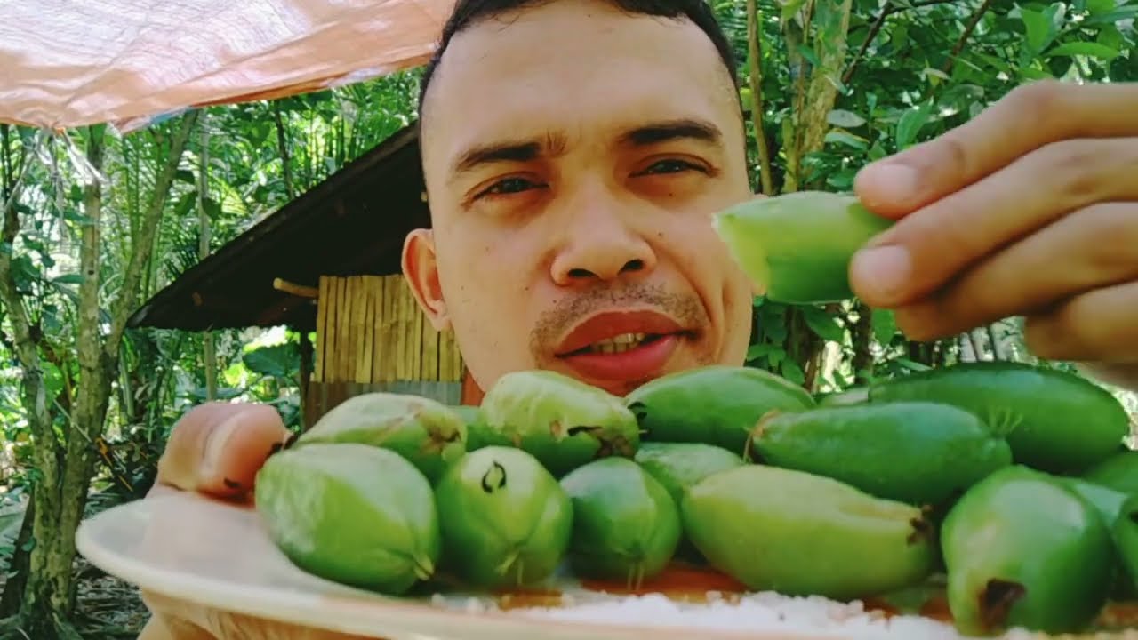 Eating Bumbling Plum (Kamias)