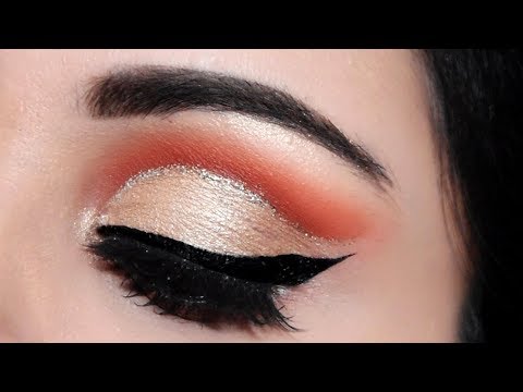 Learn how to apply a full cut crease eye shadow technique in 3 simple steps :) i have done very makeup using gold and orange shades.