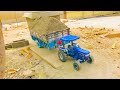 Farmtrac 6050 pulling heavyweight trolley from sand