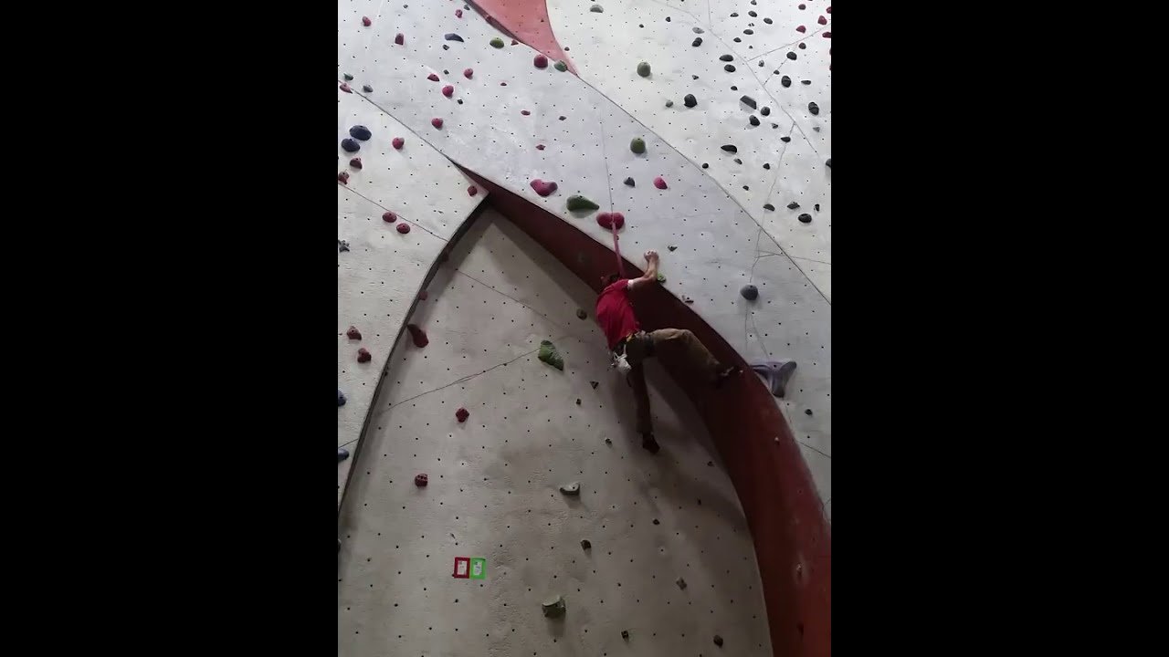 Climbing Red 5.11d Autobelay at Vertical Endeavors Bloomington, MN
