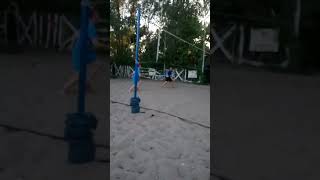 Beach volleyball, hitting the bar.