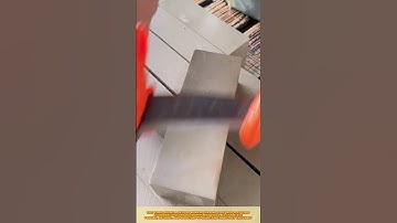 Knife sharpening quality check: Skilled worker test edge, ensure sharpness, and refine precision