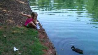 Layla feeding the ducks