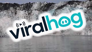 Large Chunk of Glacier Causes Wave as It Crashes Into the Ocean || ViralHog