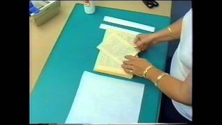 Book Repair - Re-inserting loose pages